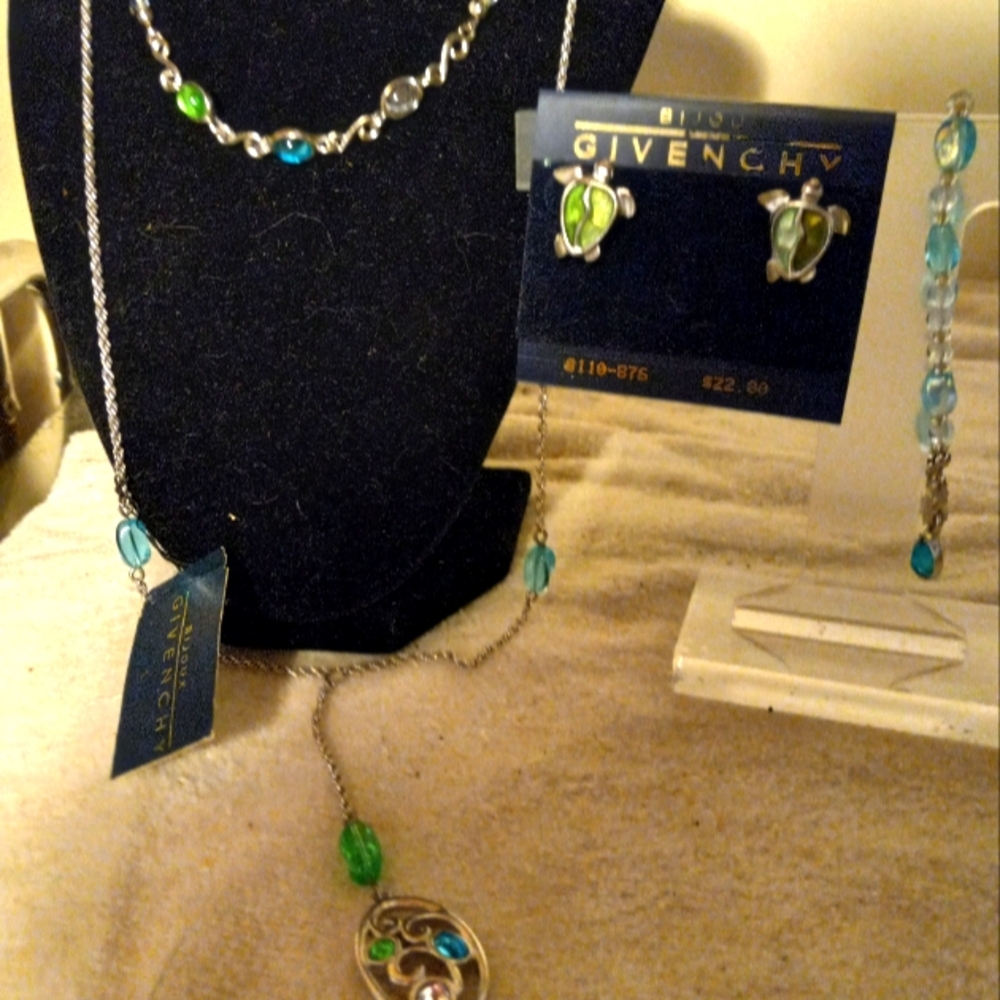 Not new never worn with 3 original tags 4pc Givenchy silver&turquoise jewelry .